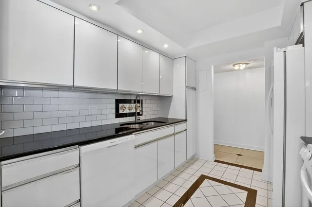 a kitchen with a stove and a microwave
