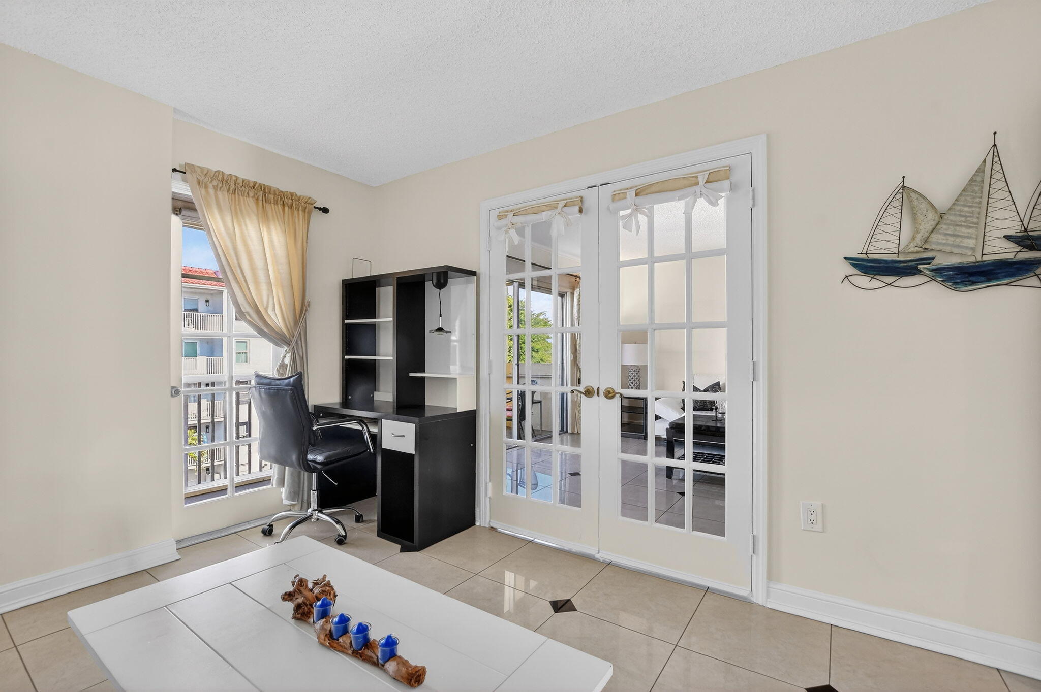 951 De Soto Road, Unit 427 Boca Raton, FL 33432 - Photo 21 of 50 a view of livingroom with furniture and windows