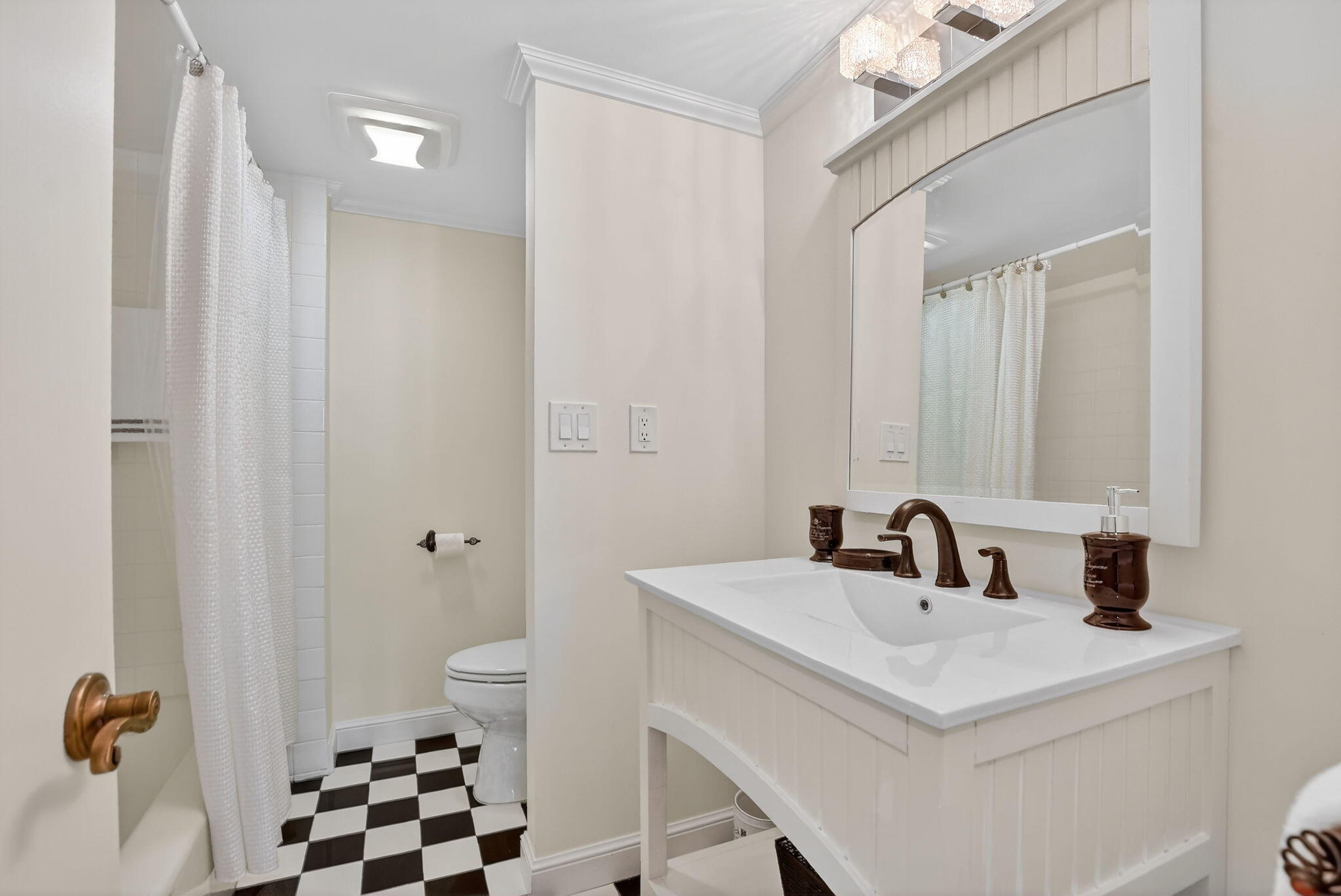 951 De Soto Road, Unit 427 Boca Raton, FL 33432 - Photo 31 of 50 a bathroom with a sink toilet and shower