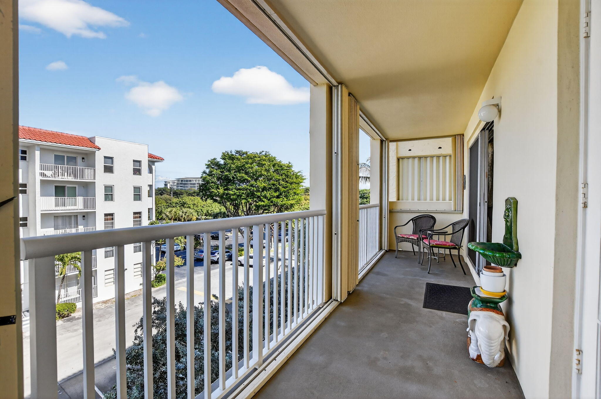 951 De Soto Road, Unit 427 Boca Raton, FL 33432 - Photo 37 of 50 a view of a porch with furniture