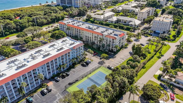 a view of house with yard
