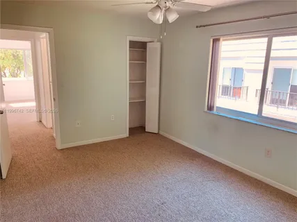 an empty room that has a window