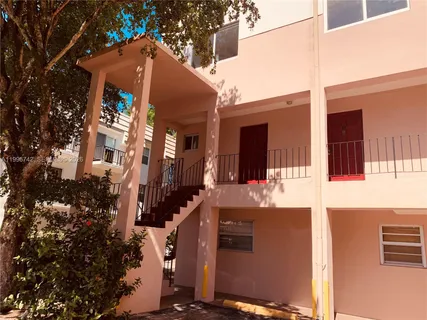 a front view of a house with yard