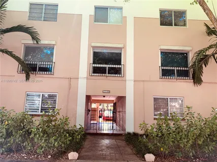 a front view of a building with glass windows