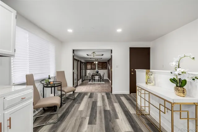 a view of a dining room with furniture window and outside view