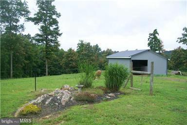 803 Turkey Ridge Road Castleton, VA 22716 - Photo 12 of 14 a view of a backyard