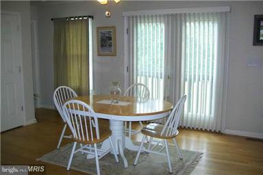 803 Turkey Ridge Road Castleton, VA 22716 - Photo 5 of 14 a view of a dining room with furniture and window