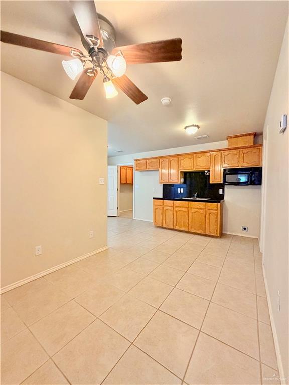 20724 North Fm 493 Road Edcouch, TX 78538 - Photo 14 of 20 a large white room with a large window
