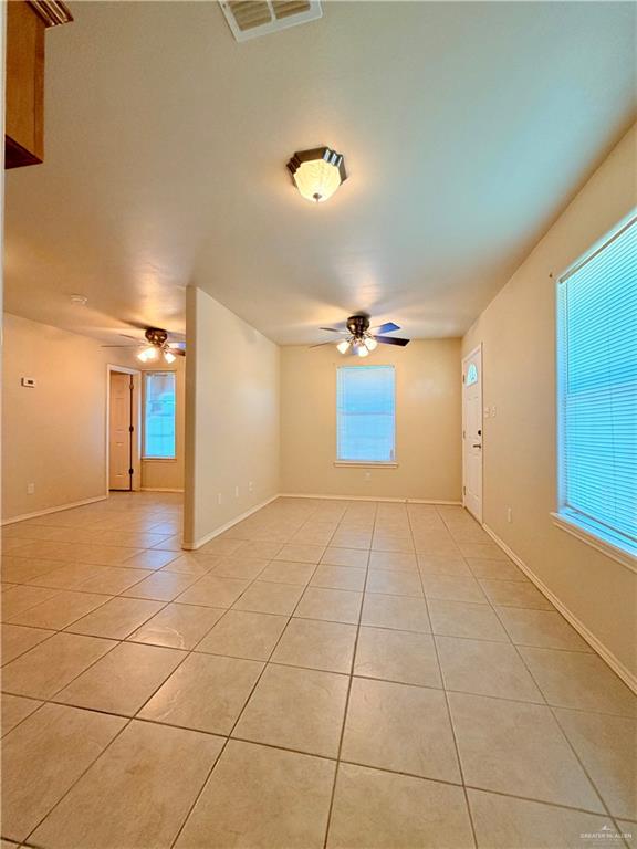 20724 North Fm 493 Road Edcouch, TX 78538 - Photo 15 of 20 a view of a livingroom with a pathway and a chandelier