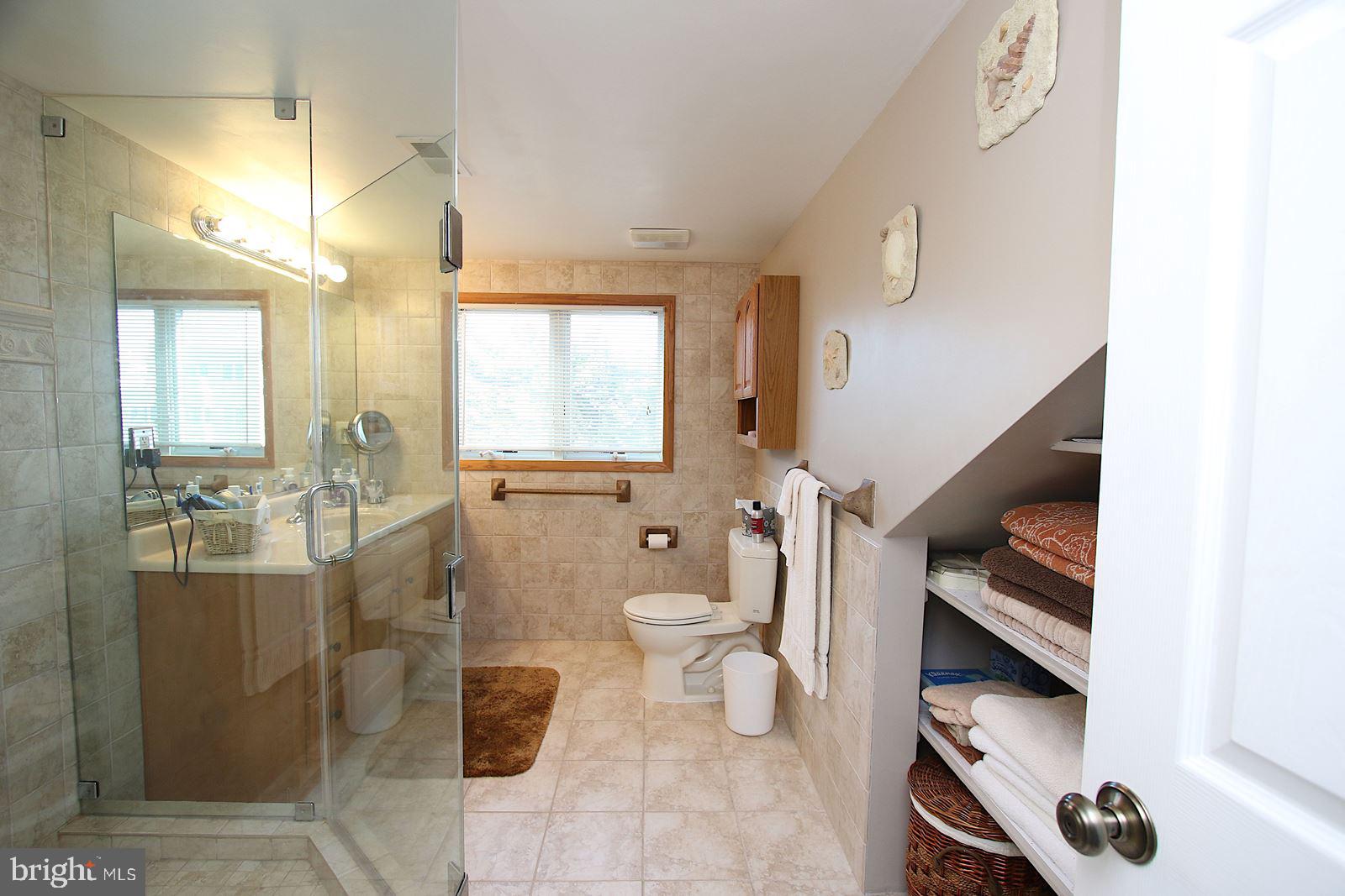 45 Amherst Road Long Beach Township, NJ 08006 - Photo 33 of 35 suite's bath & under eave's shelving