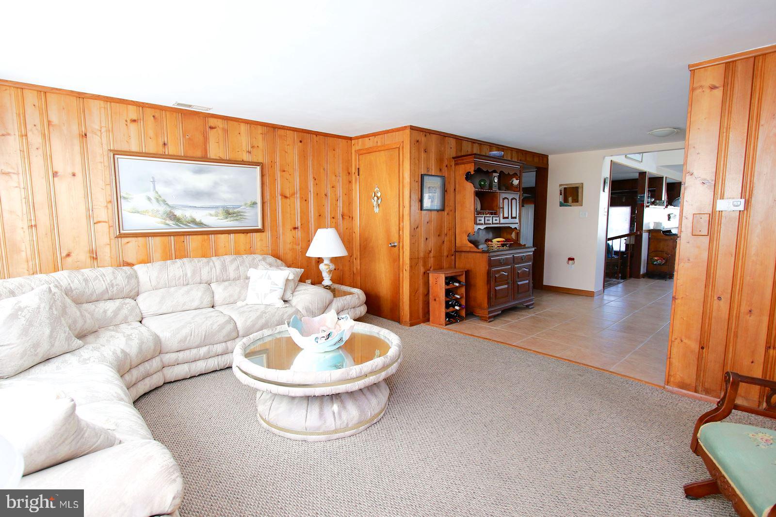 45 Amherst Road Long Beach Township, NJ 08006 - Photo 6 of 35 living room opens to a huge kitchen & dining area