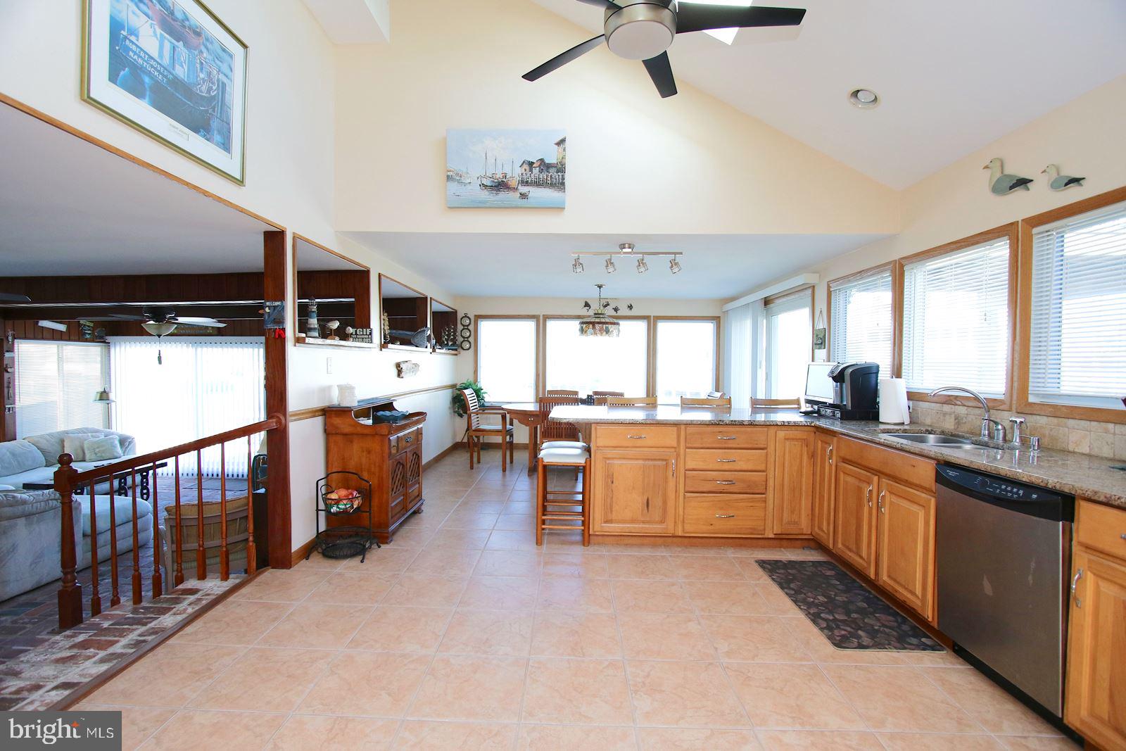 45 Amherst Road Long Beach Township, NJ 08006 - Photo 7 of 35 kitchen to waterfront dining & family room