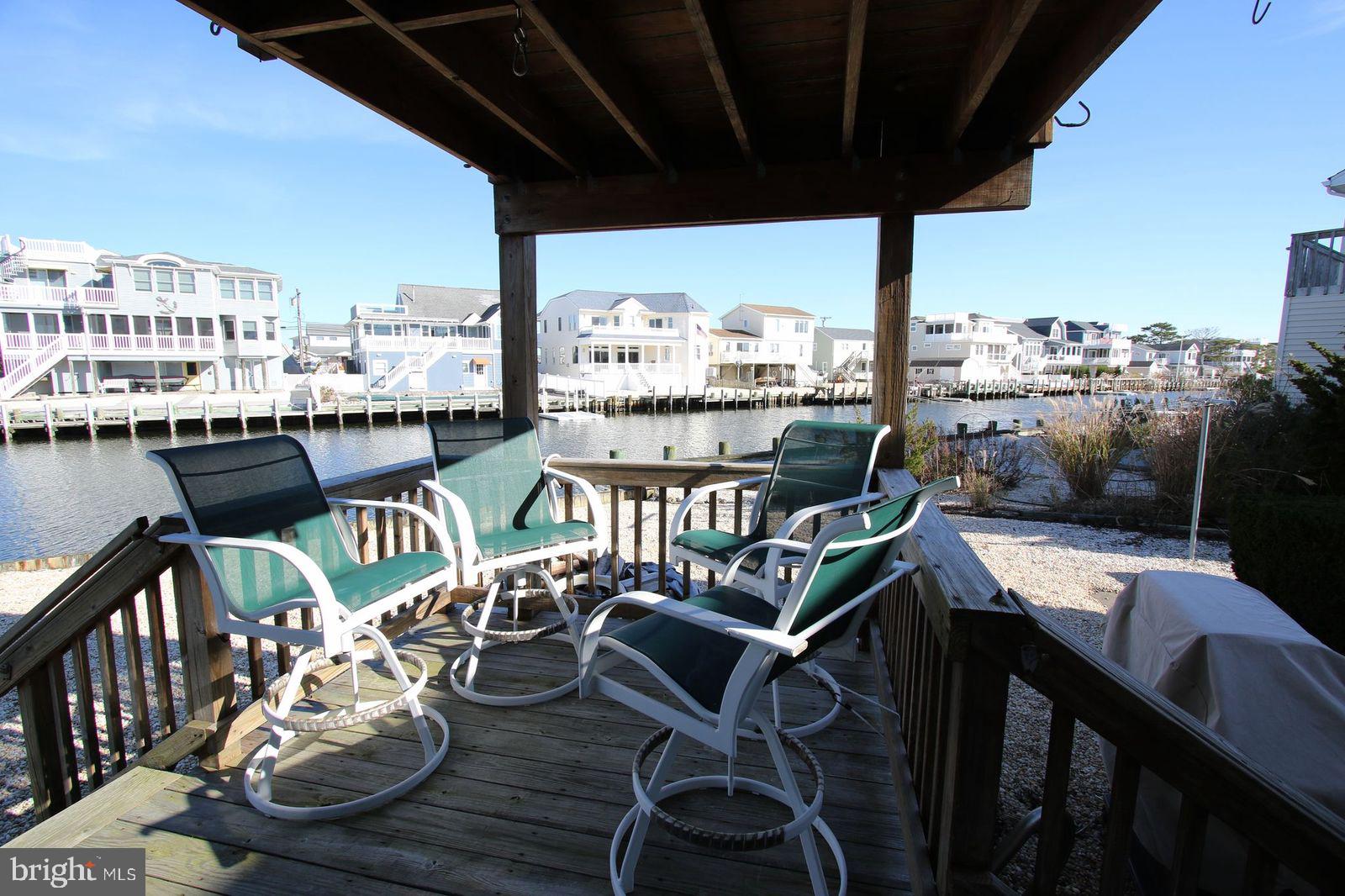 45 Amherst Road Long Beach Township, NJ 08006 - Photo 9 of 35 cocktail deck off kitchen by grilling station