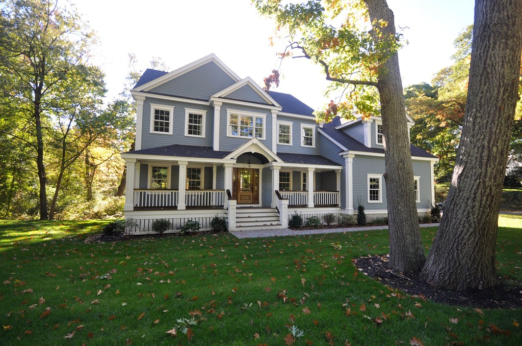 60 Munroe Road Lexington, MA 02421 - Photo 1 of 24 a front view of a house with a yard