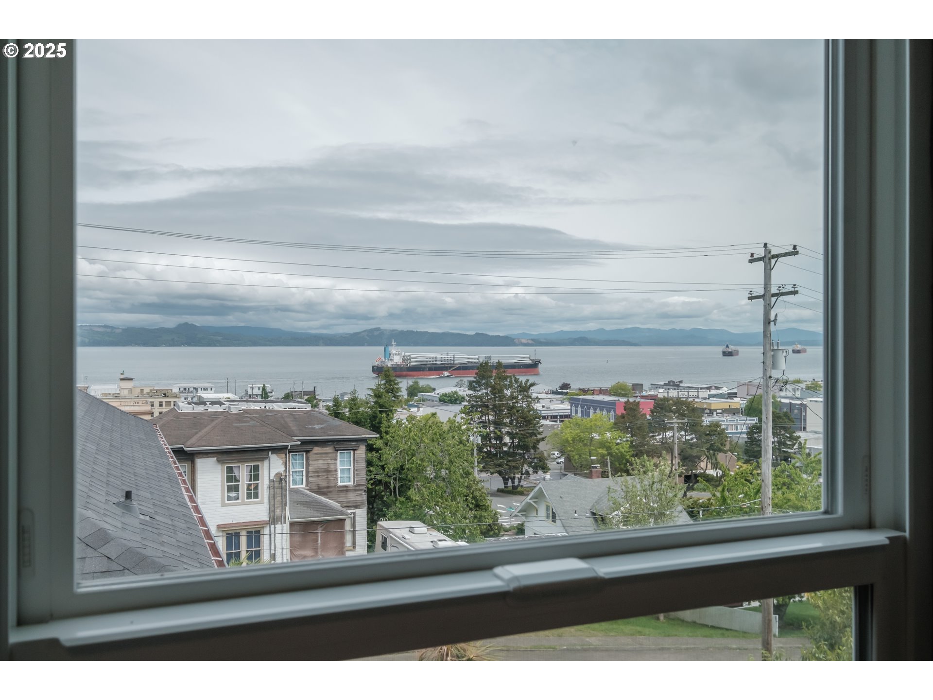 640 8th Street Astoria, OR 97103 - Photo 11 of 21 a view of sky from window