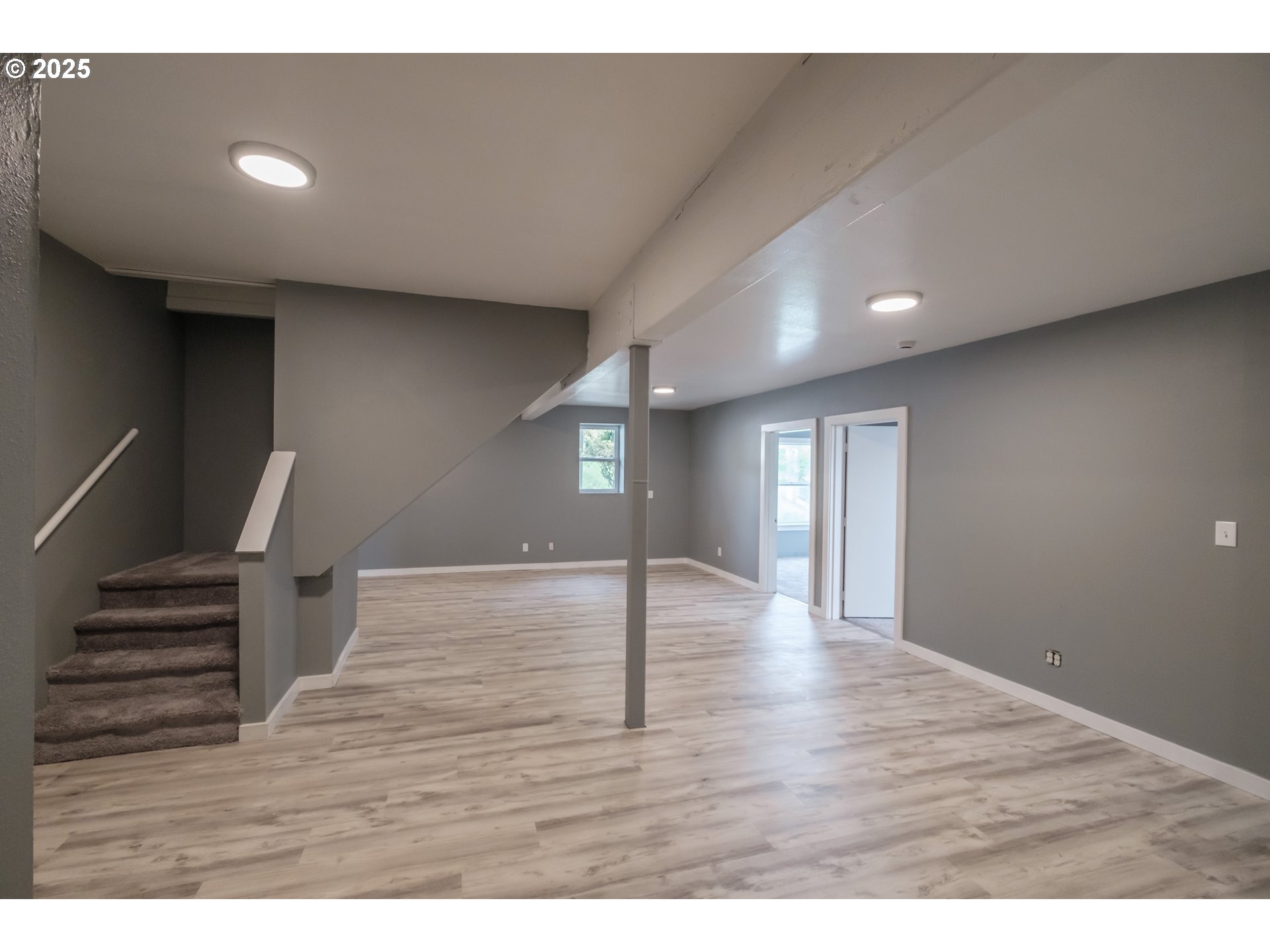640 8th Street Astoria, OR 97103 - Photo 13 of 21 a view of an empty room with wooden floor