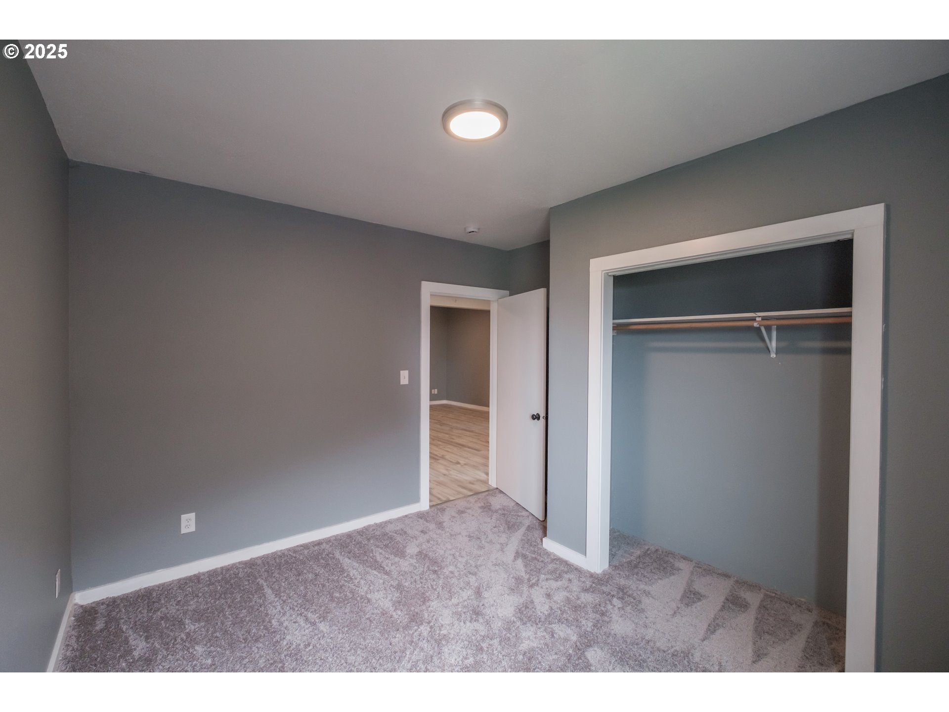 640 8th Street Astoria, OR 97103 - Photo 16 of 21 a view of an empty room and window