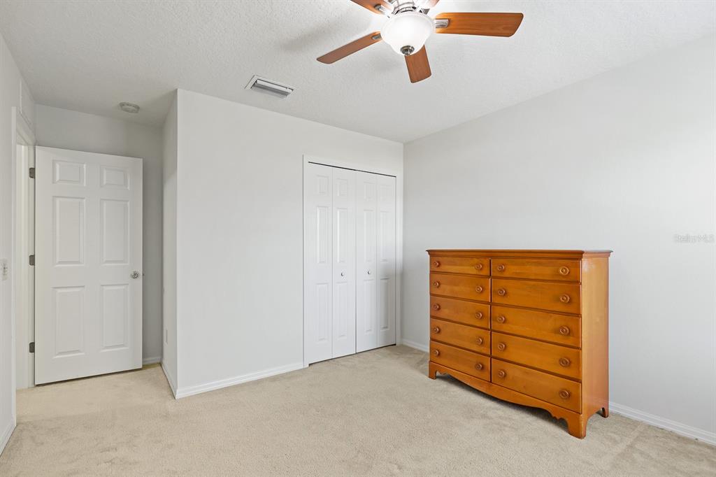 1411 Main Street Valrico, FL 33594 - Photo 26 of 44 a view of an empty room with a cabinet