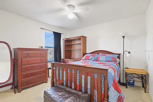 a bedroom with a bed and a closet