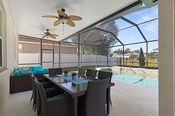 a view of a dining room with furniture window and outside view