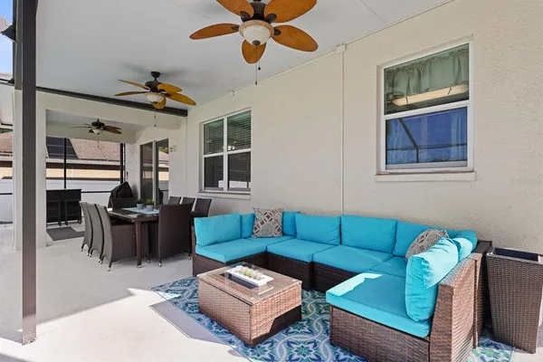a living room with furniture and a window