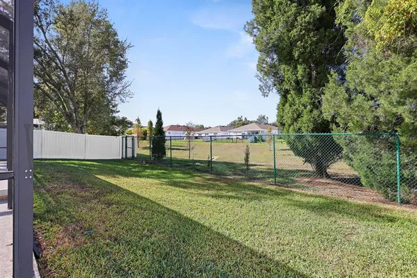 a view of backyard with green space