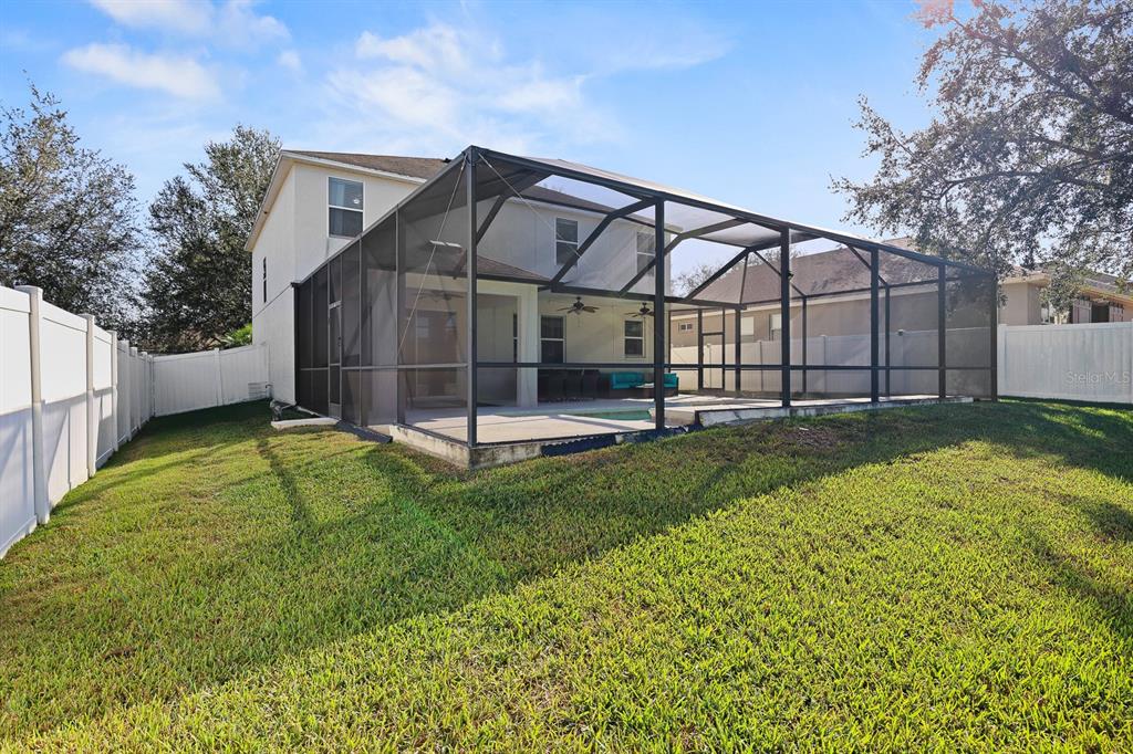 1411 Main Street Valrico, FL 33594 - Photo 43 of 44 a view of backyard with green space