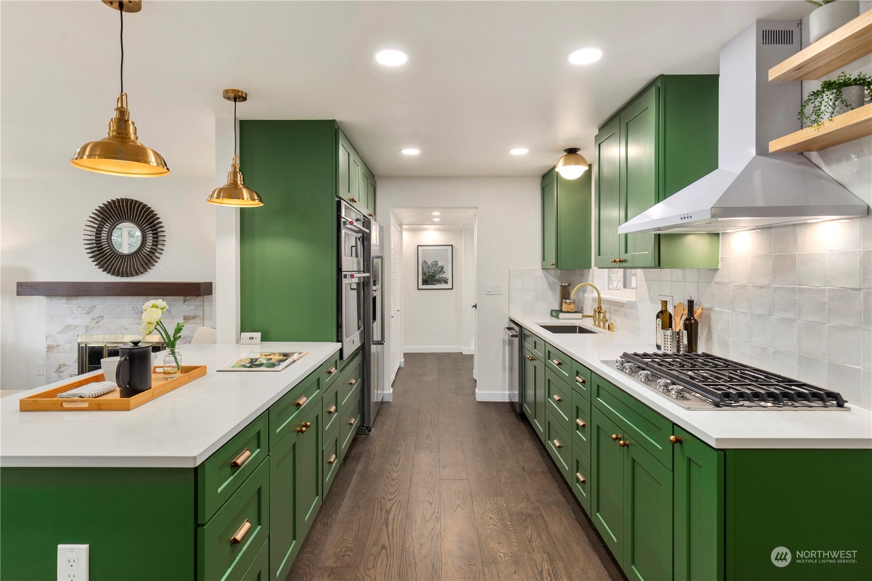 21613 6th Avenue West Bothell, WA 98021 - Photo 11 of 37 a kitchen with sink stove and cabinets