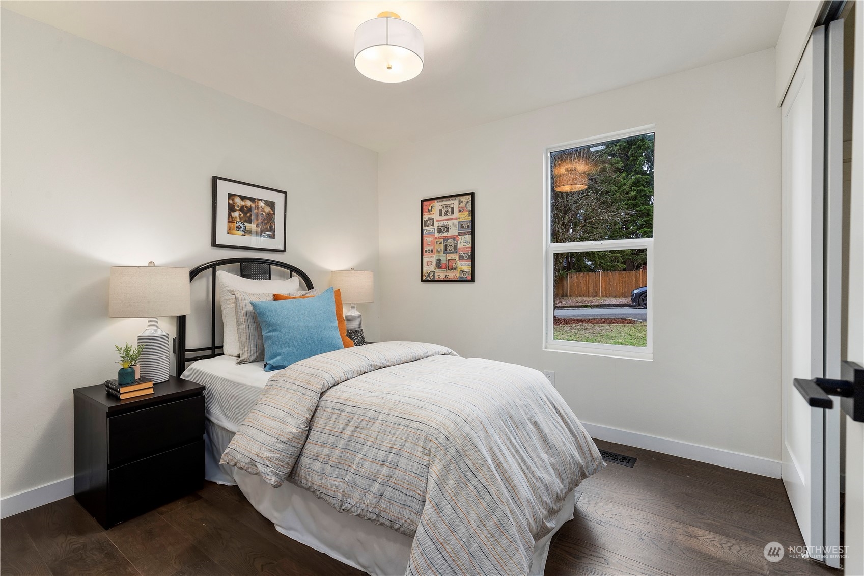 21613 6th Avenue West Bothell, WA 98021 - Photo 15 of 37 a bedroom with a bed and a window