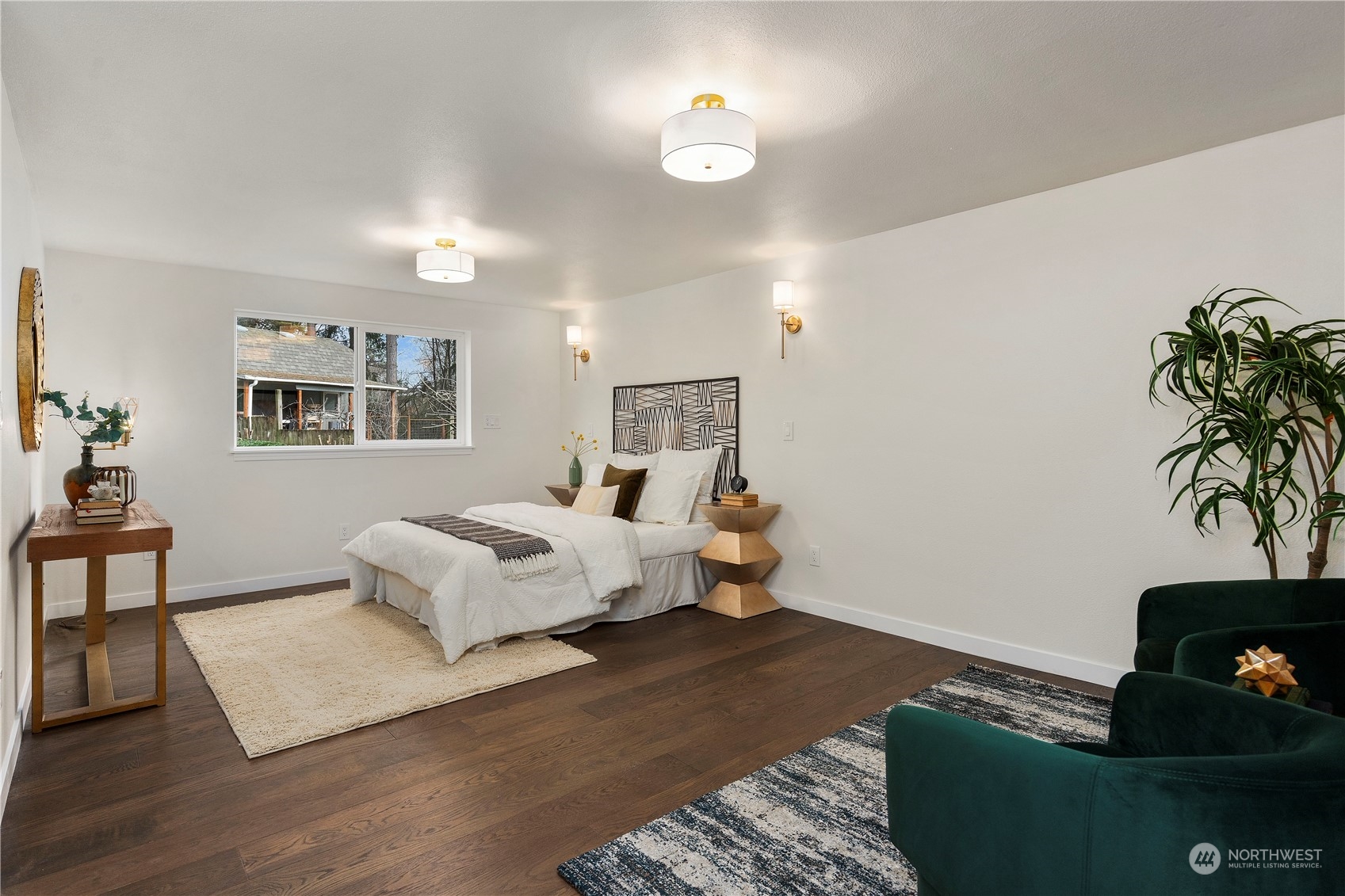 21613 6th Avenue West Bothell, WA 98021 - Photo 18 of 37 a bedroom with furniture and a potted plant