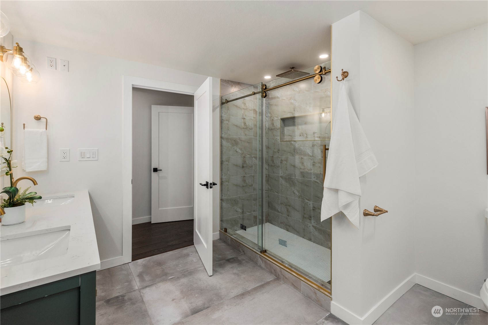 21613 6th Avenue West Bothell, WA 98021 - Photo 24 of 37 a bathroom with a shower and a sink