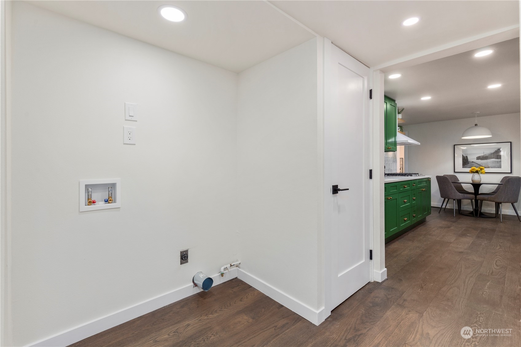 21613 6th Avenue West Bothell, WA 98021 - Photo 27 of 37 a view of a room with wooden floor and furniture
