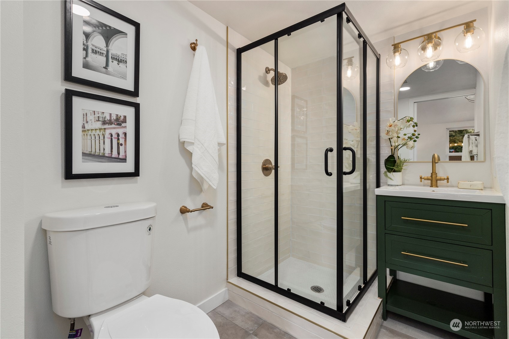 21613 6th Avenue West Bothell, WA 98021 - Photo 29 of 37 a bathroom with a toilet a sink and a mirror