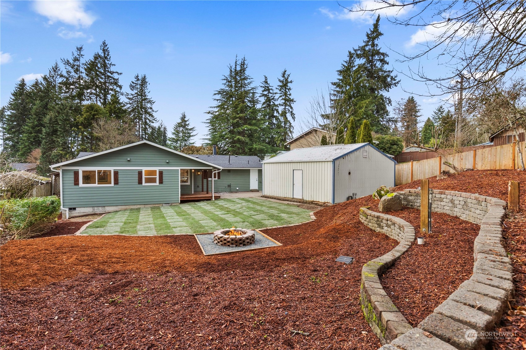 21613 6th Avenue West Bothell, WA 98021 - Photo 34 of 37 a front view of house with yard and trees in the background