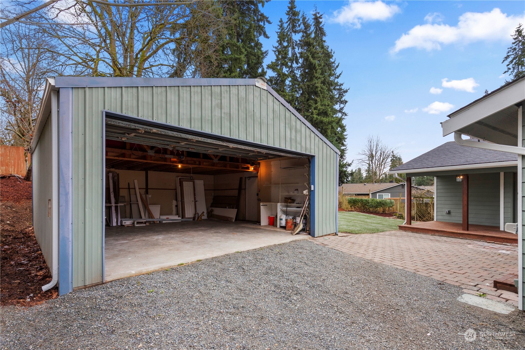 21613 6th Avenue West Bothell, WA 98021 - Photo 36 of 37 a view of a house with a porch and a garage