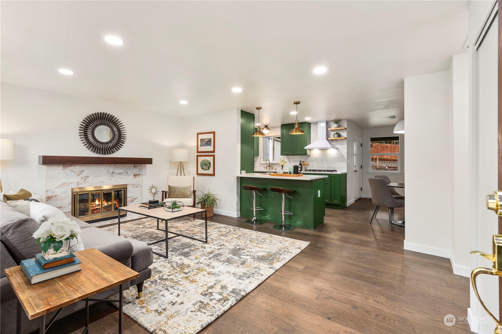 21613 6th Avenue West Bothell, WA 98021 - Photo 4 of 37 a living room with fireplace furniture and a table