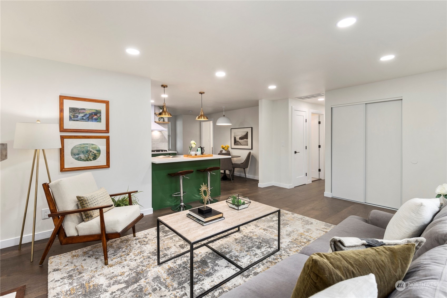 21613 6th Avenue West Bothell, WA 98021 - Photo 5 of 37 a living room with a couch and kitchen view