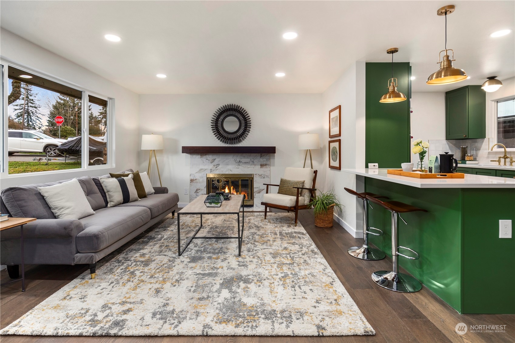 21613 6th Avenue West Bothell, WA 98021 - Photo 6 of 37 a living room with furniture and a fireplace