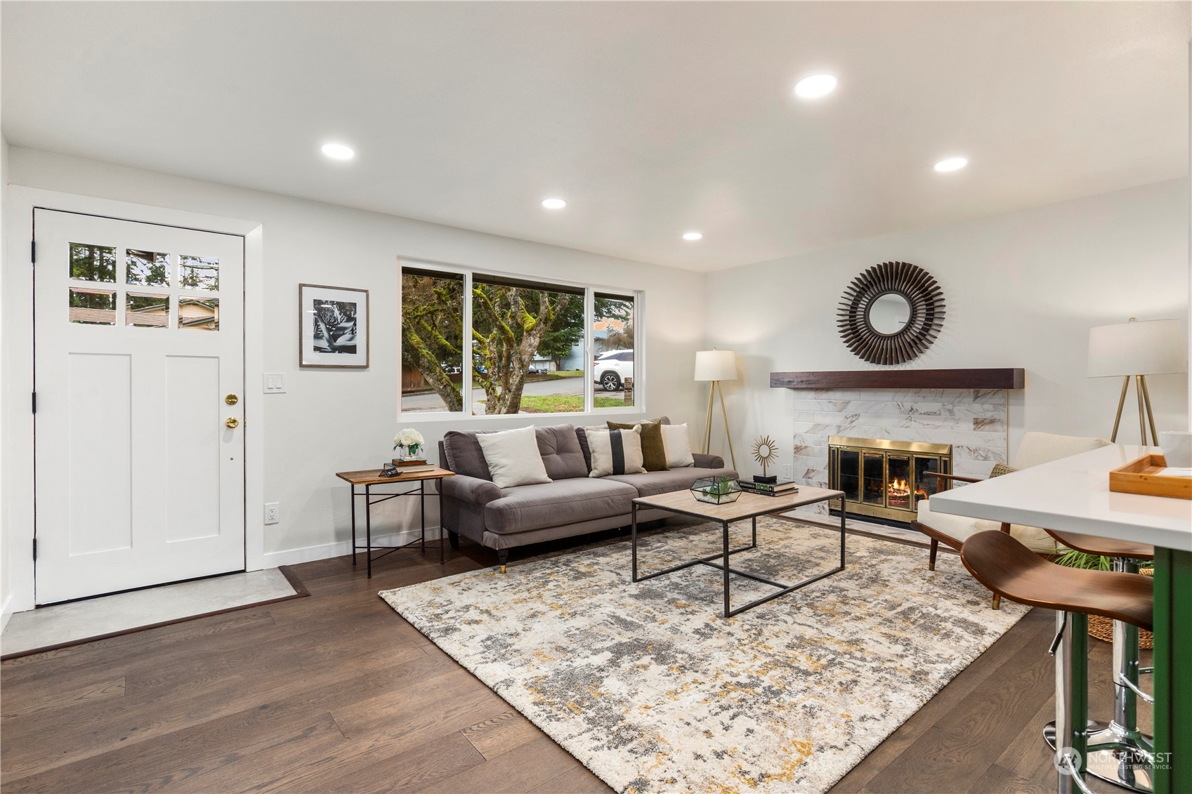 21613 6th Avenue West Bothell, WA 98021 - Photo 7 of 37 a living room with furniture and a fireplace