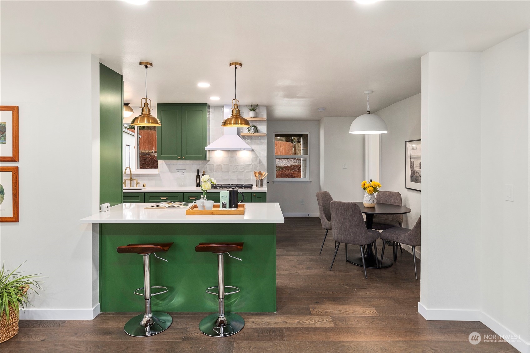 21613 6th Avenue West Bothell, WA 98021 - Photo 8 of 37 a kitchen with a sink cabinets and wooden floor