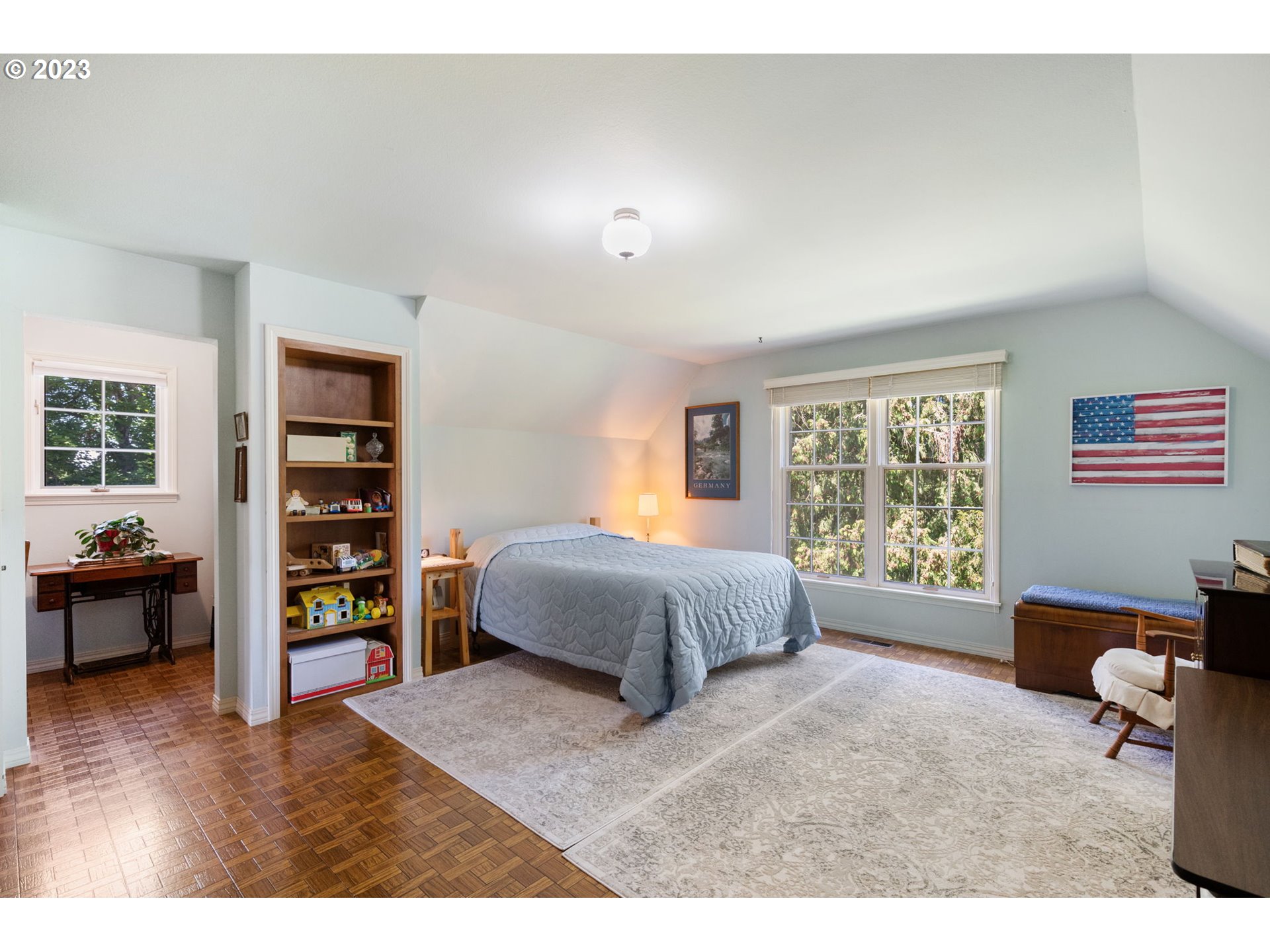 30681 South Needy Road Canby, OR 97013 - Photo 19 of 48 a spacious bedroom with a large bed and a book shelf
