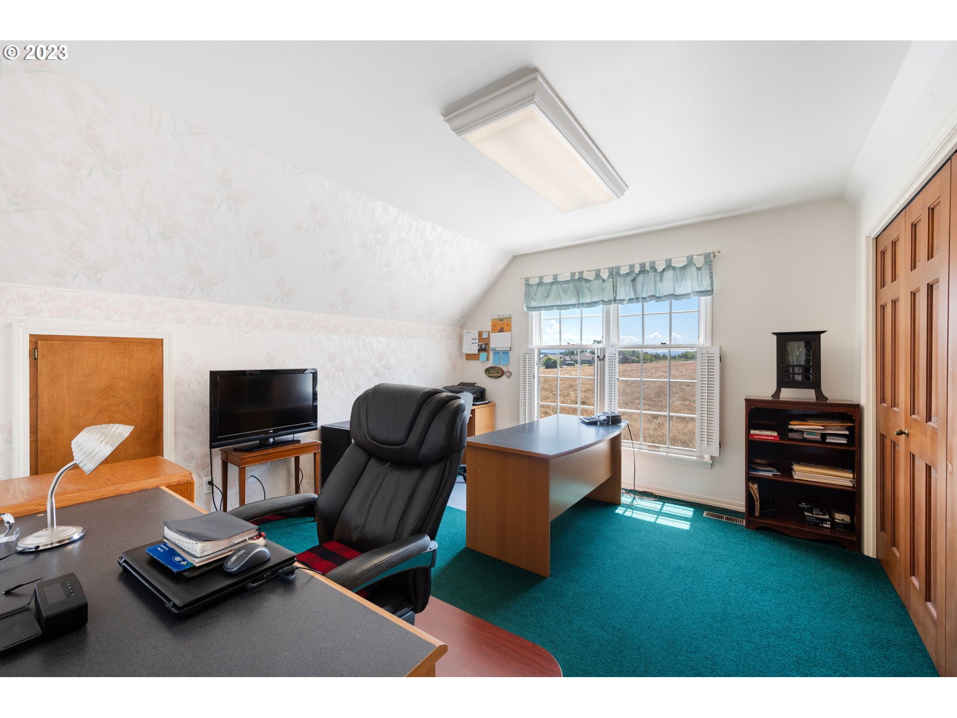 30681 South Needy Road Canby, OR 97013 - Photo 22 of 48 a living room with furniture and a flat screen tv