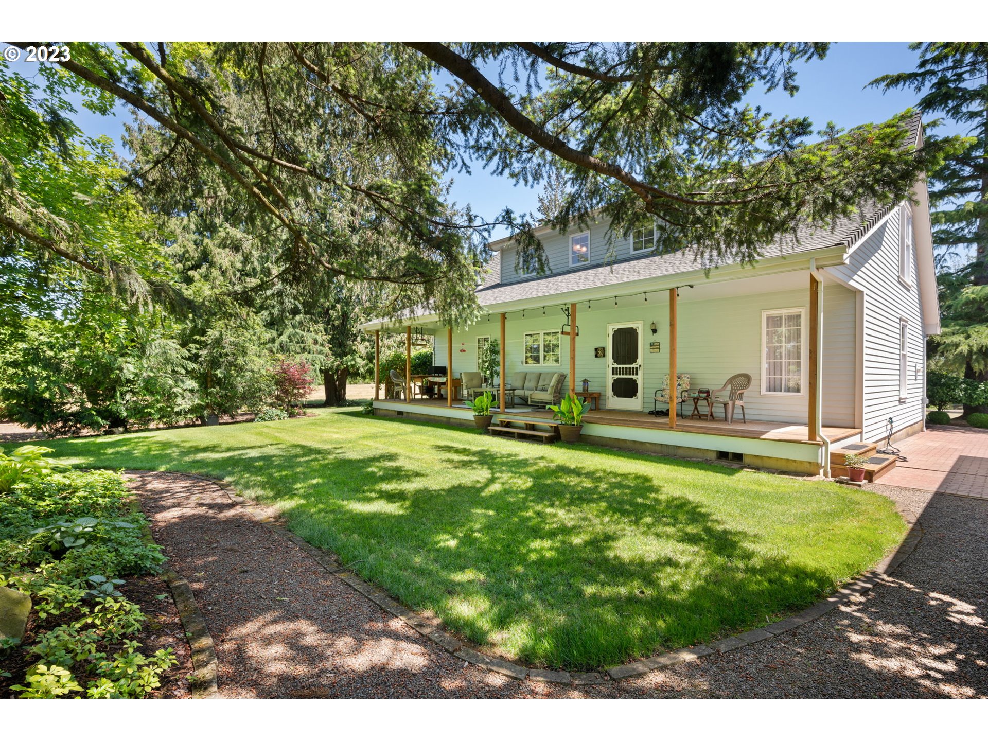 30681 South Needy Road Canby, OR 97013 - Photo 30 of 48 a view of a house with backyard and sitting area