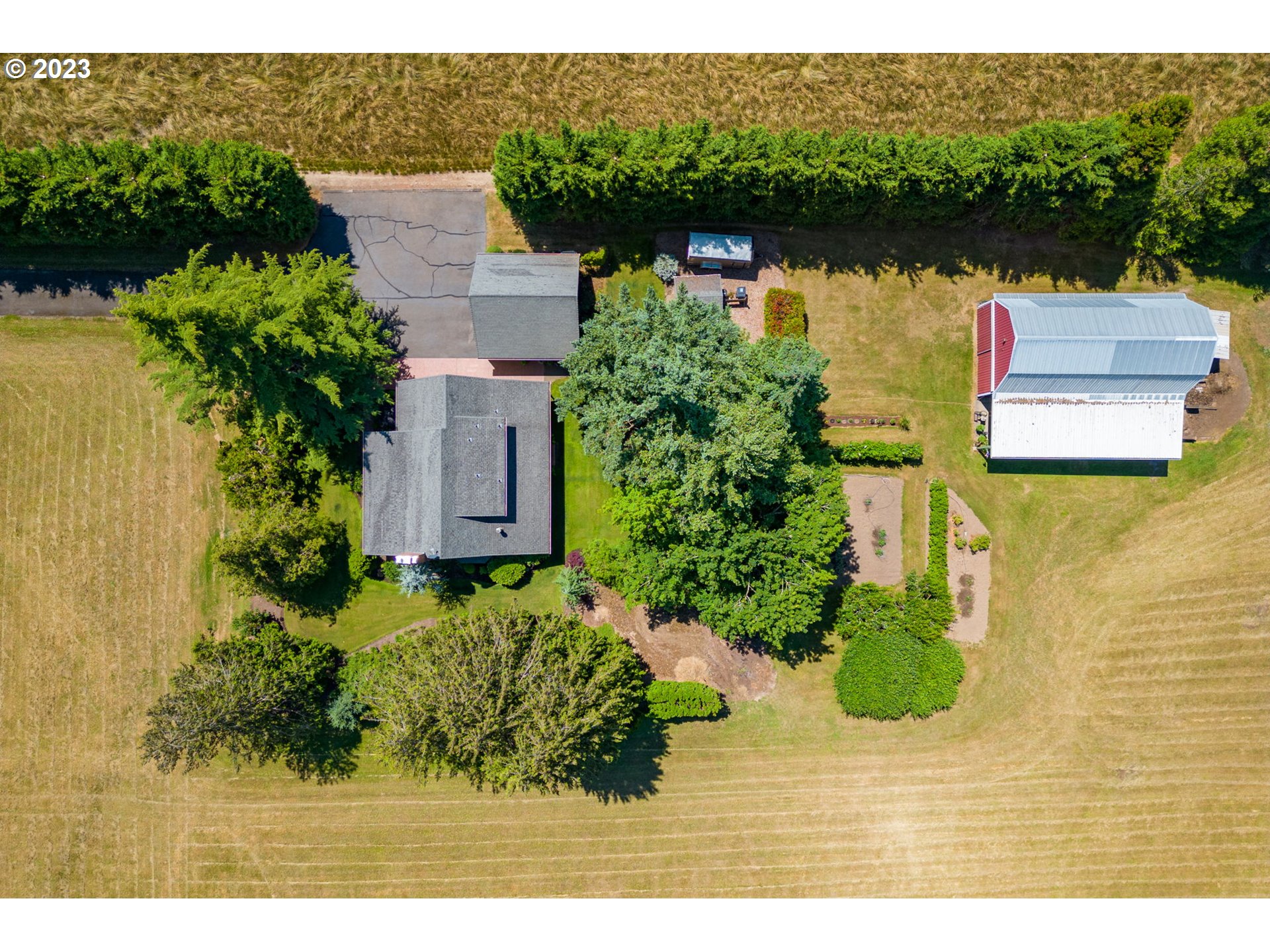 30681 South Needy Road Canby, OR 97013 - Photo 40 of 48 an aerial view of a house with a yard and lake view
