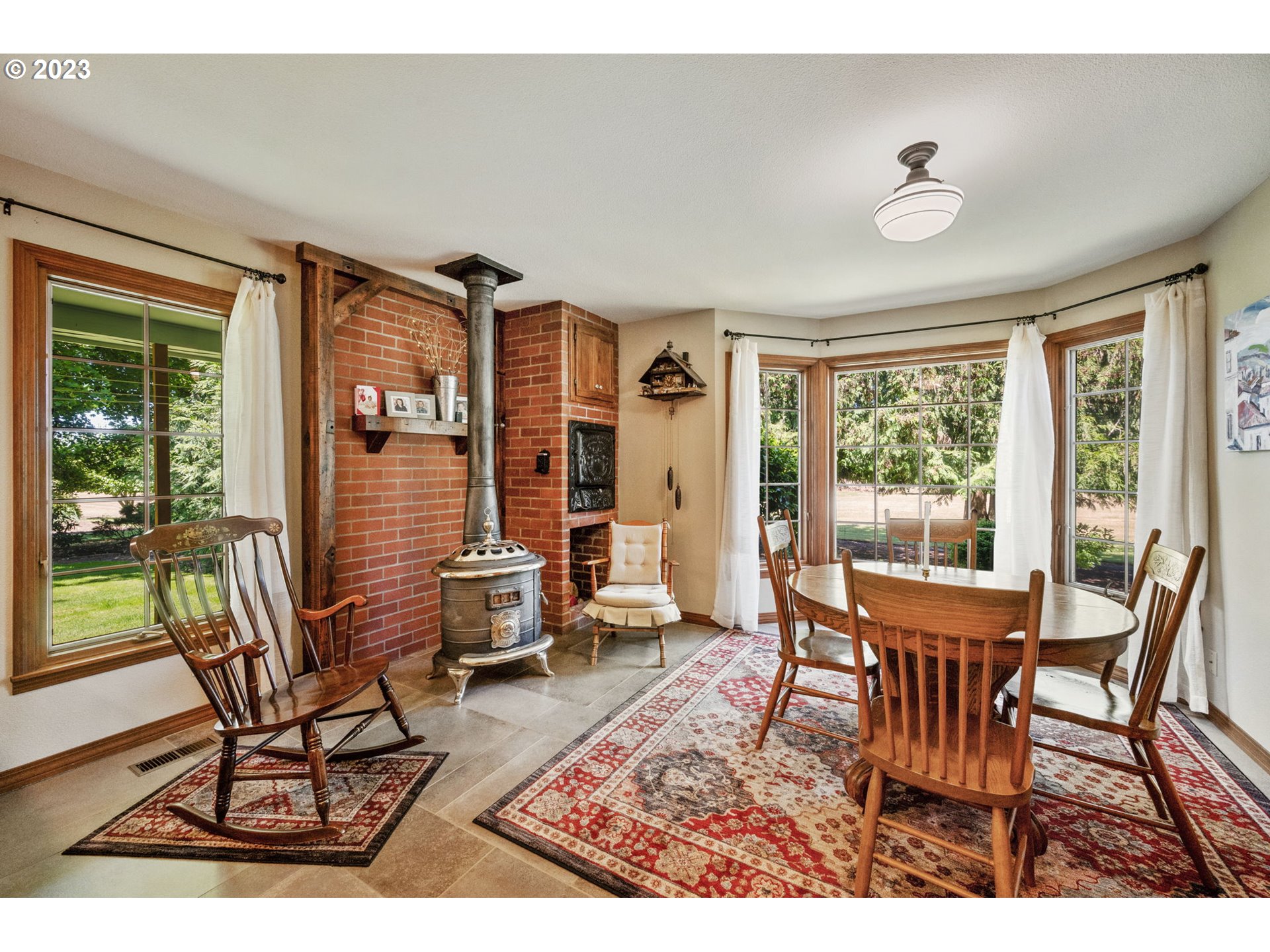 30681 South Needy Road Canby, OR 97013 - Photo 9 of 48 a view of a dining room with furniture window and outside view