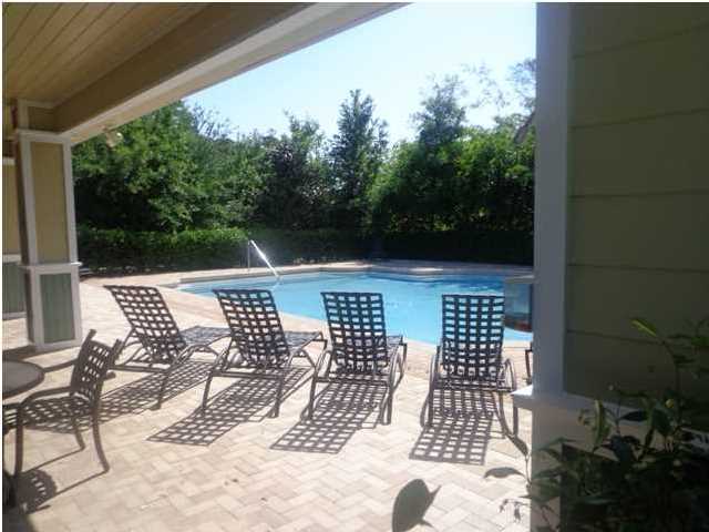 96 Morgans Trail Santa Rosa Beach, FL 32459 - Photo 6 of 13 a view of balcony with wooden floor and outdoor seating