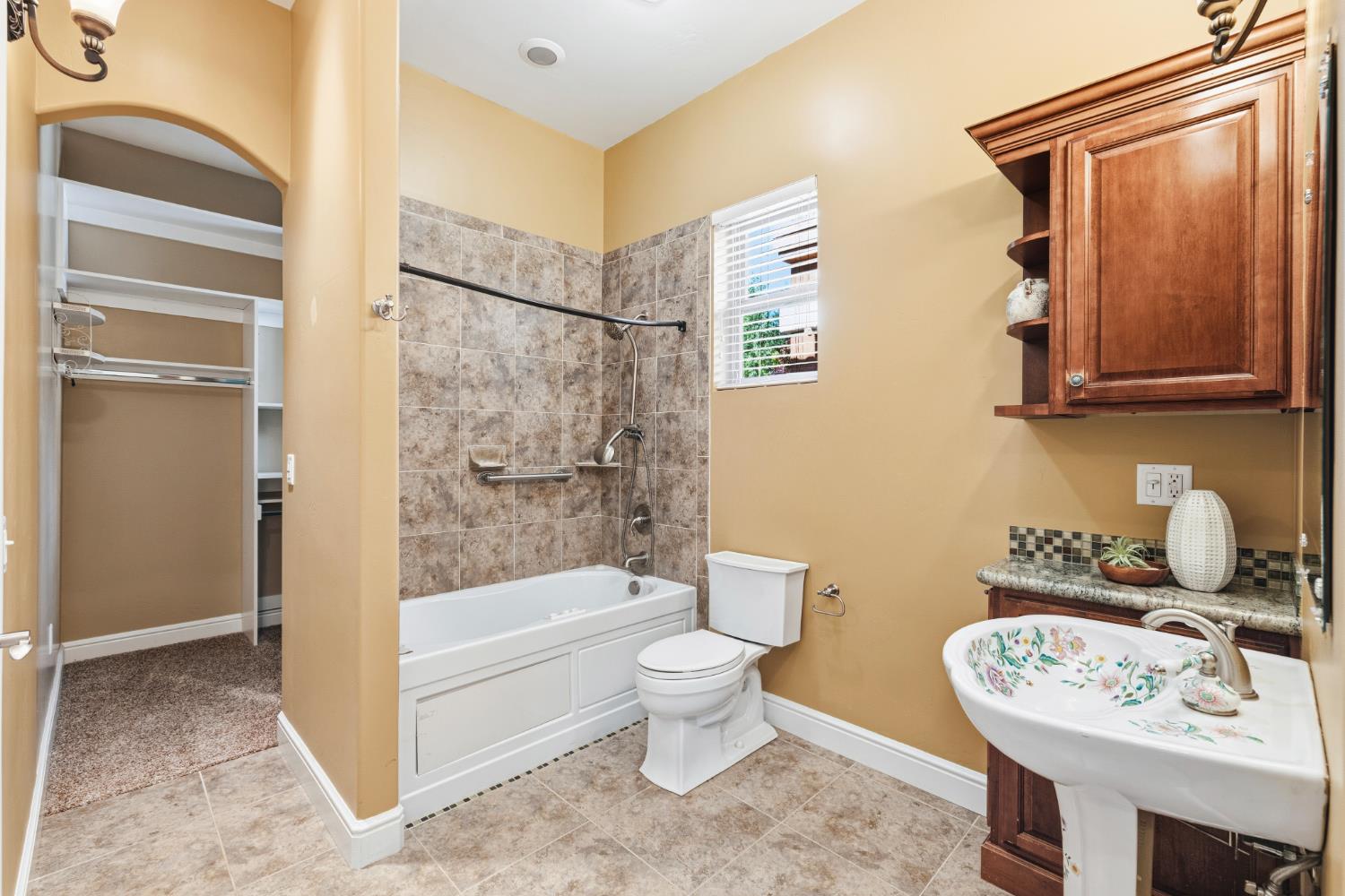 3047 Travois Circle Rescue, CA 95672 - Photo 25 of 94 a bathroom with a sink a toilet and shower