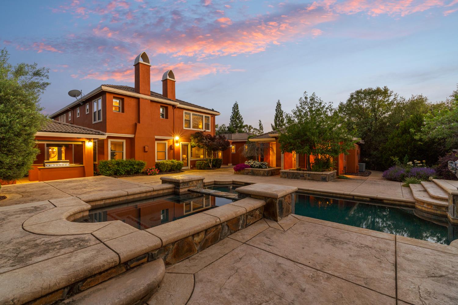 3047 Travois Circle Rescue, CA 95672 - Photo 90 of 94 a front view of a house with swimming pool having outdoor seating