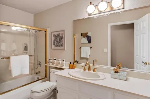 a bedroom with bed and window