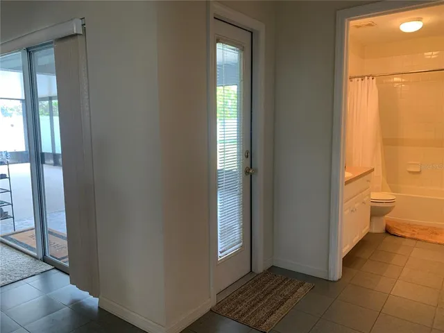 a view of a bathroom with toilet